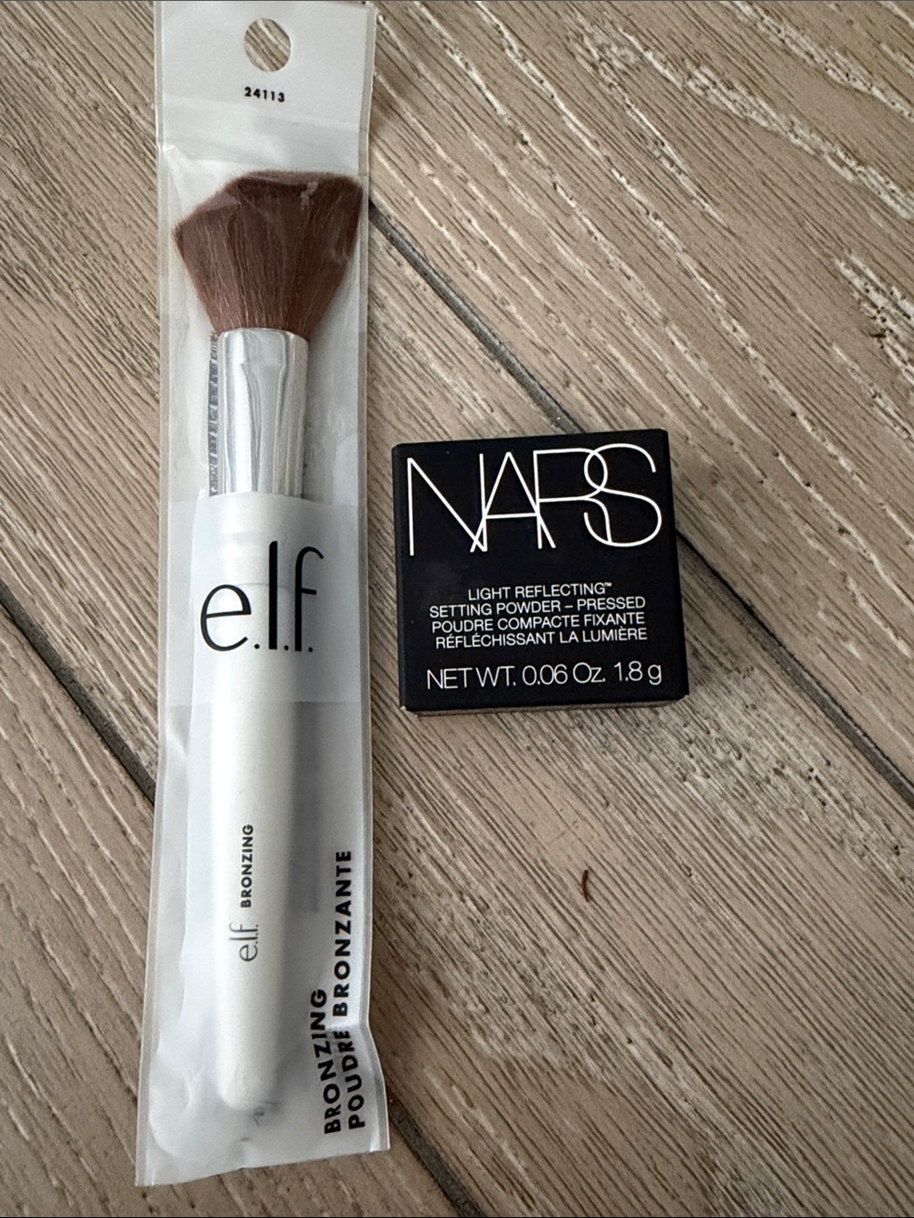 Elf make up brush and NARS Light Reflecting Setting Powder NEW